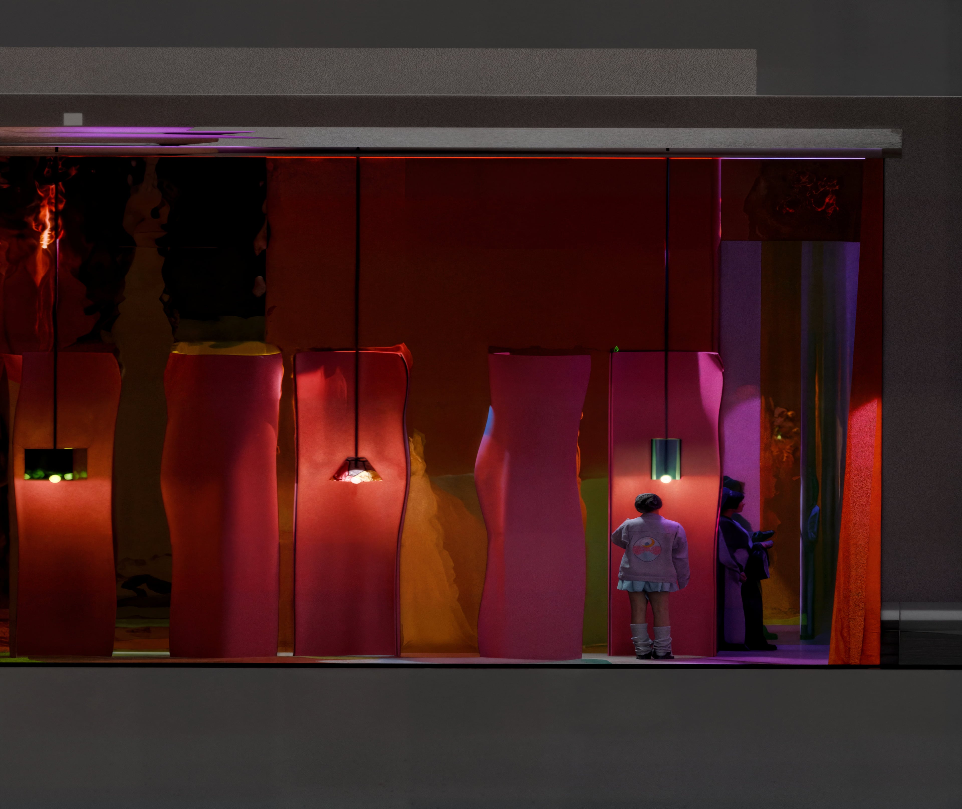 Colourful lit corridor with a visitor